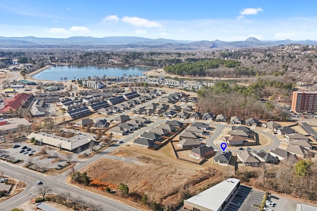 aerial view with a water and mountain view