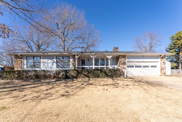 single story home featuring a garage