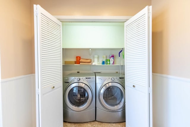 washroom featuring separate washer and dryer