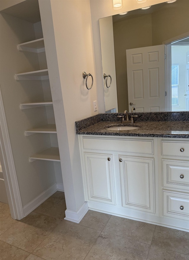 bathroom featuring vanity and tile patterned floors