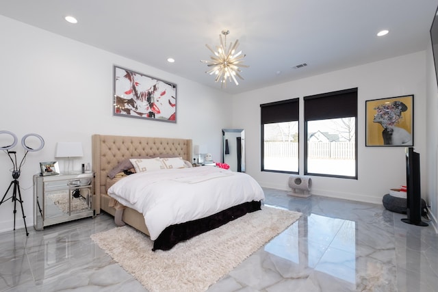 bedroom with an inviting chandelier