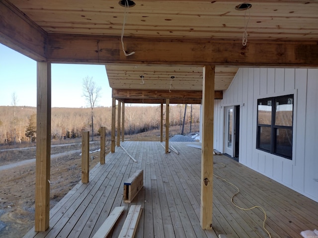 wooden terrace featuring a rural view