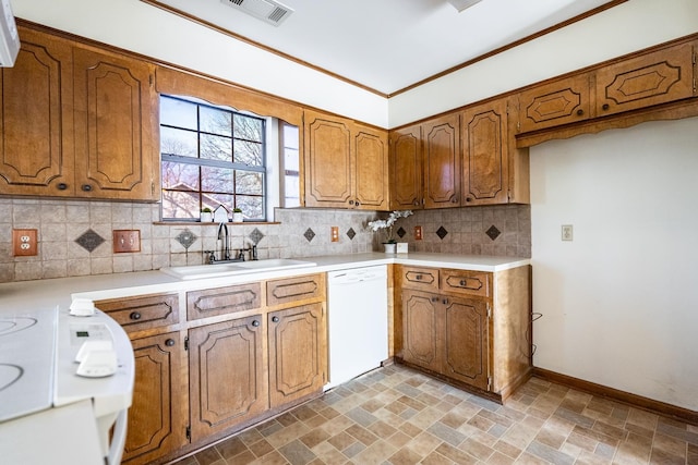 kitchen with ornamental molding, white dishwasher, sink, and decorative backsplash