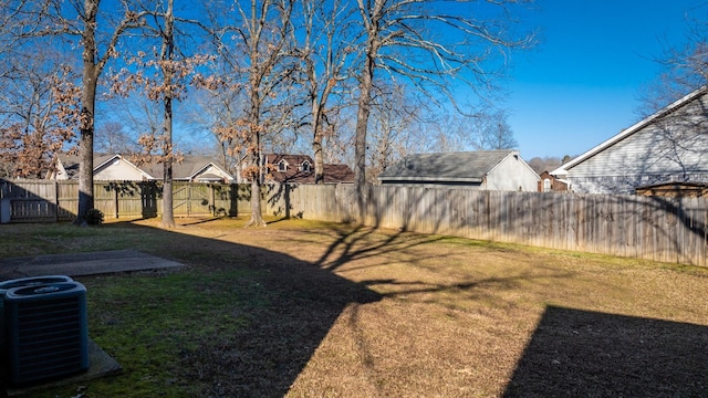 view of yard with central AC