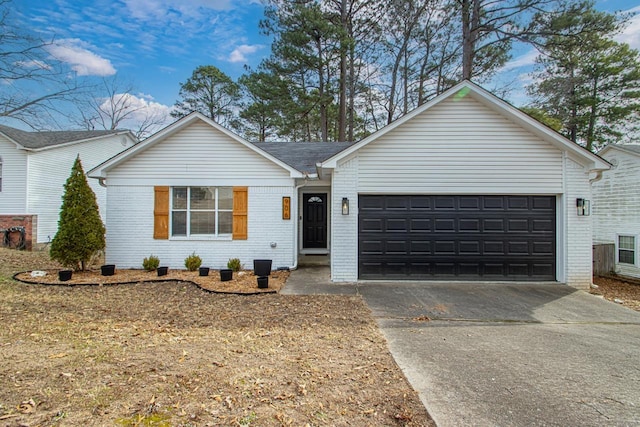 ranch-style home with a garage