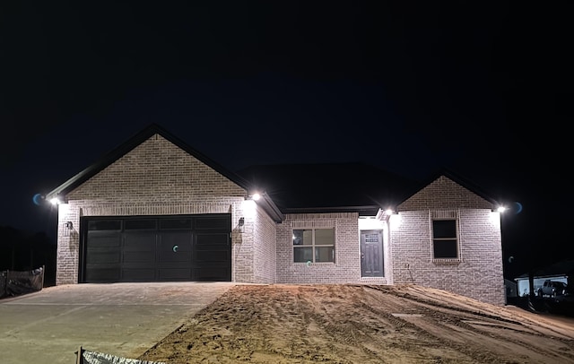 view of front of home featuring a garage