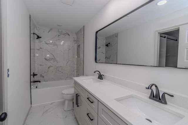 full bathroom with tiled shower / bath combo, vanity, and toilet