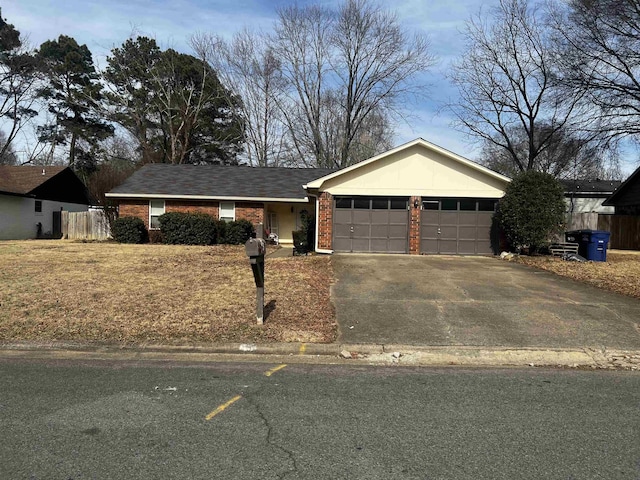 single story home with a garage