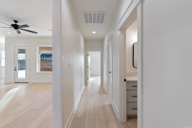 hall featuring light hardwood / wood-style floors