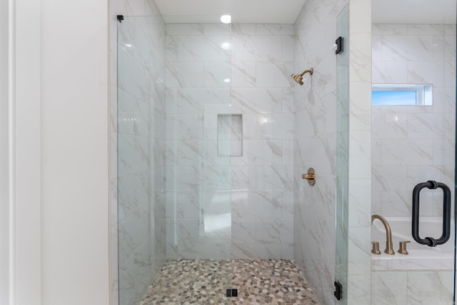 bathroom with an enclosed shower