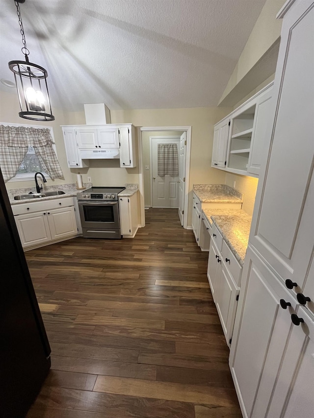 kitchen featuring pendant lighting, sink, electric range, and white cabinets