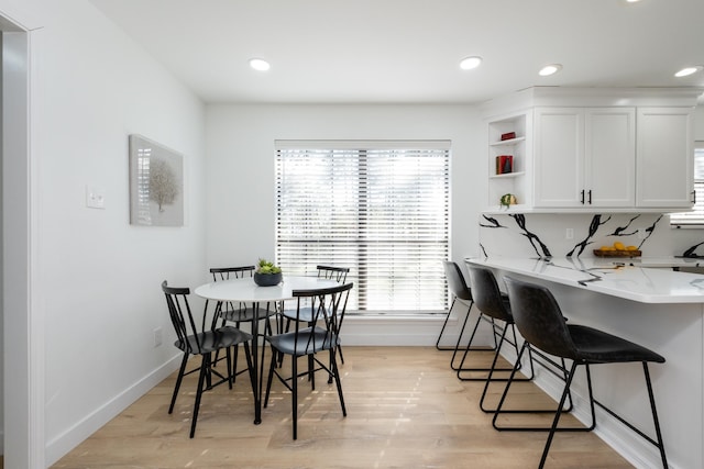 dining room with light hardwood / wood-style floors