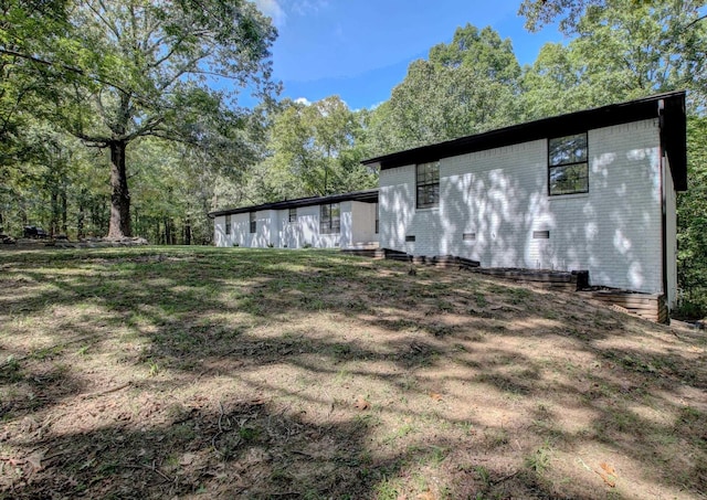 exterior space with a lawn