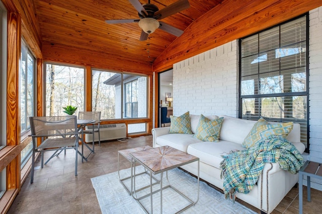 sunroom / solarium with ceiling fan, vaulted ceiling, a wall unit AC, and wooden ceiling