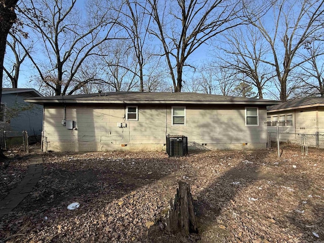 back of house featuring central AC unit