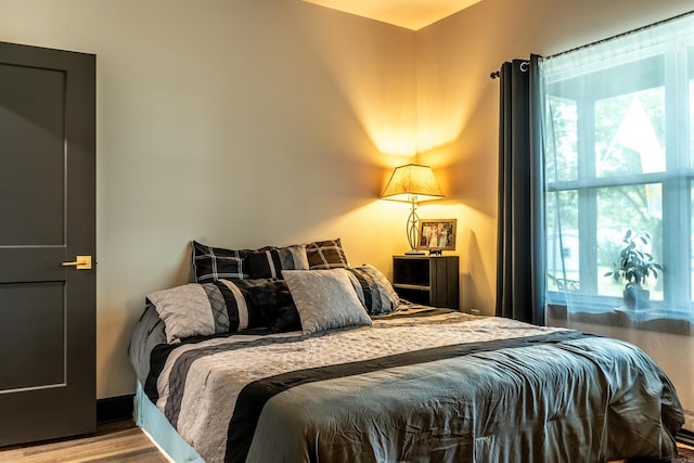 bedroom featuring light hardwood / wood-style floors