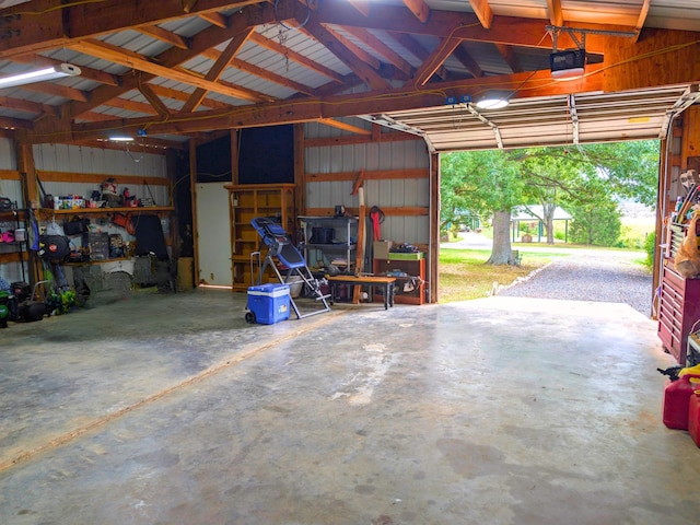 garage featuring a garage door opener