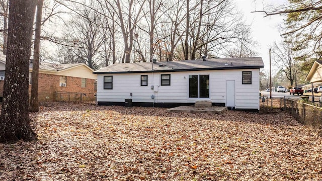 back of property featuring a patio