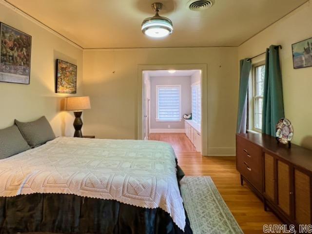 bedroom featuring light hardwood / wood-style floors