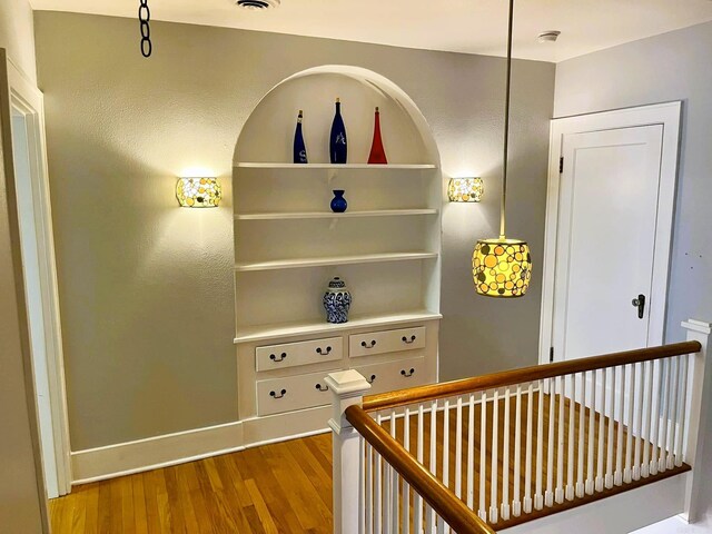 hallway with light wood-type flooring