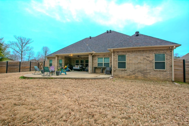 rear view of house with a patio area