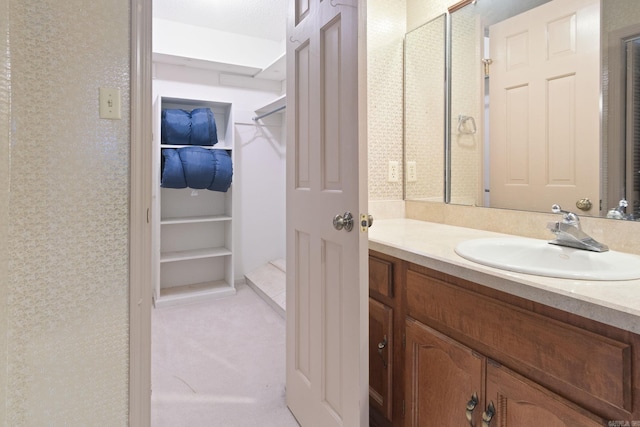 bathroom with vanity and tile patterned flooring