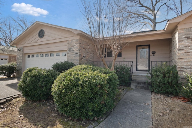 single story home featuring a garage