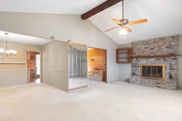 unfurnished living room with high vaulted ceiling, carpet, a fireplace, ceiling fan with notable chandelier, and beamed ceiling