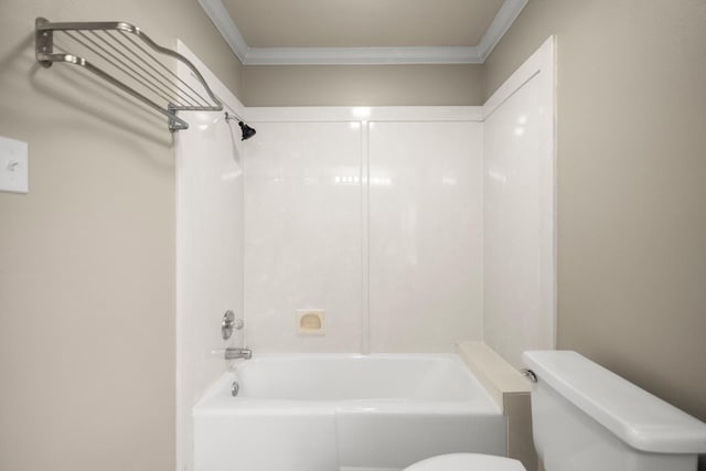 bathroom featuring ornamental molding, toilet, and shower / bath combination