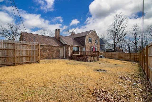 view of yard with a deck