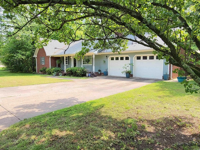 single story home with a garage and a front lawn