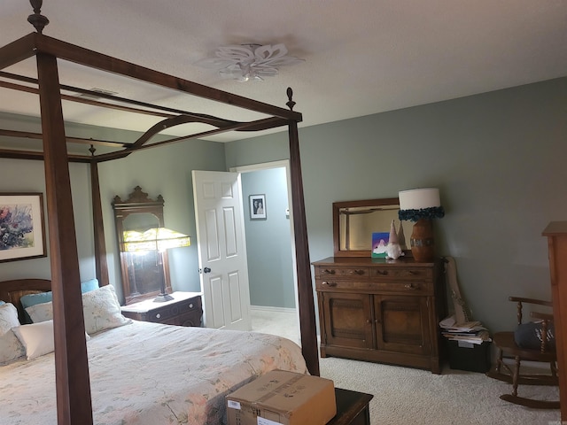 bedroom featuring light colored carpet