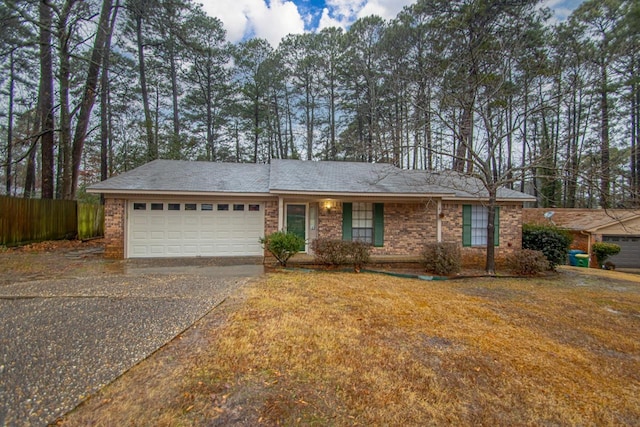 single story home featuring a garage