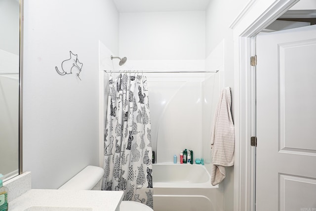 full bathroom featuring shower / tub combo, vanity, and toilet