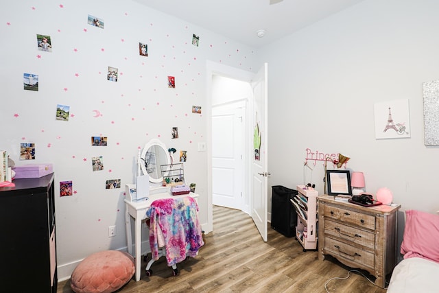 bedroom featuring hardwood / wood-style floors