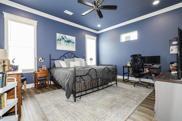 bedroom featuring dark hardwood / wood-style floors and ceiling fan