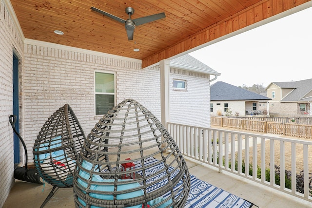 view of patio featuring ceiling fan