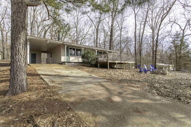 view of front of house featuring a wooden deck