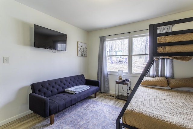 bedroom featuring wood-type flooring