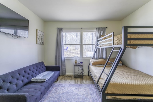 bedroom with hardwood / wood-style floors