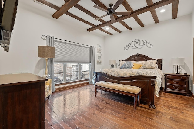 bedroom with wood-type flooring, coffered ceiling, and beam ceiling