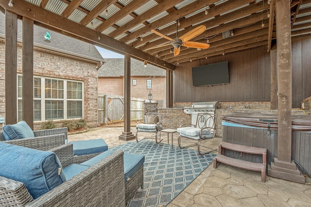 view of patio featuring a hot tub, a grill, and ceiling fan