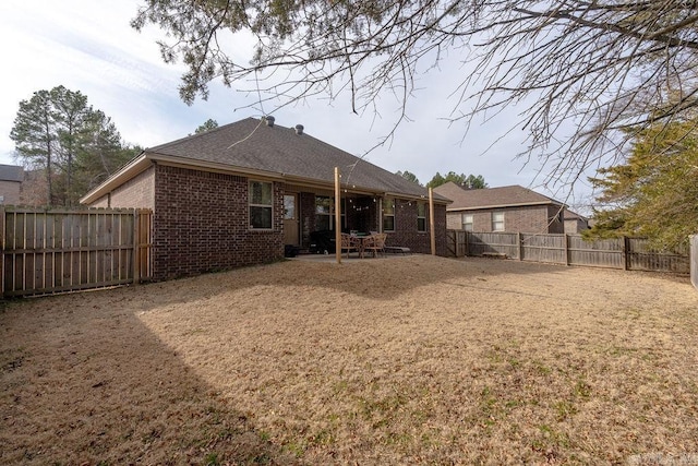 rear view of house with a patio area