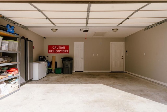 garage featuring a garage door opener and refrigerator