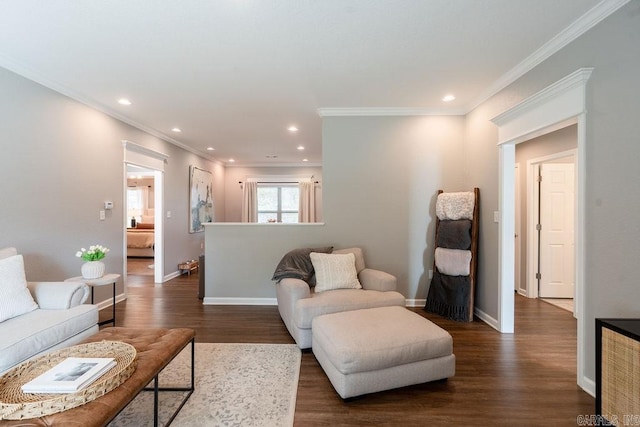 living room with crown molding and dark hardwood / wood-style floors