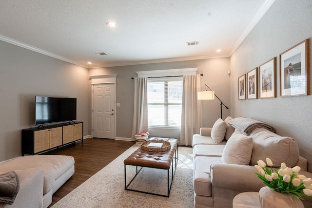 living room with crown molding and dark hardwood / wood-style floors