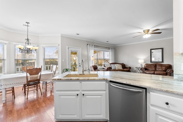 kitchen with white cabinetry, dishwasher, sink, ornamental molding, and light hardwood / wood-style flooring