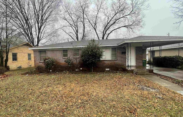 single story home featuring a carport