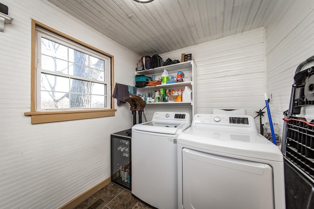 washroom featuring independent washer and dryer