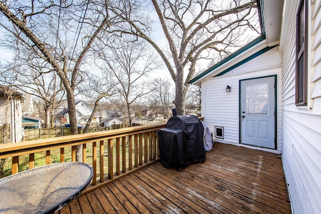 wooden deck featuring grilling area